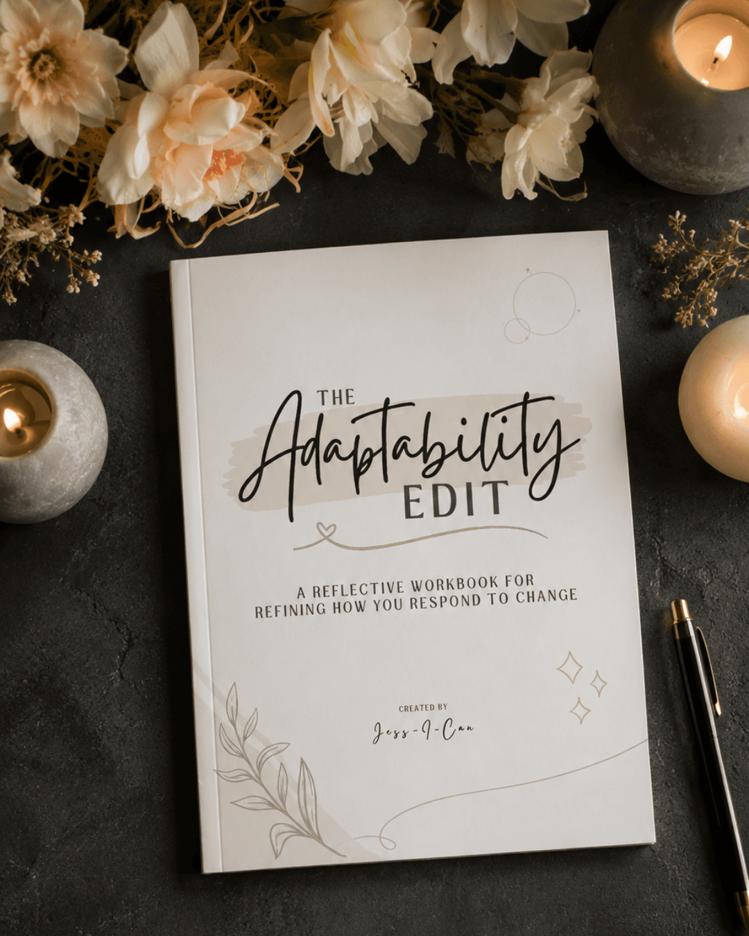 The Adaptability Edit, a reflective eBook by Jess-I-Can, resting among candles and flowers